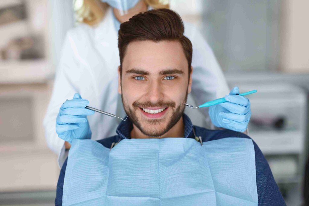 Smiling patient during dental checkup.